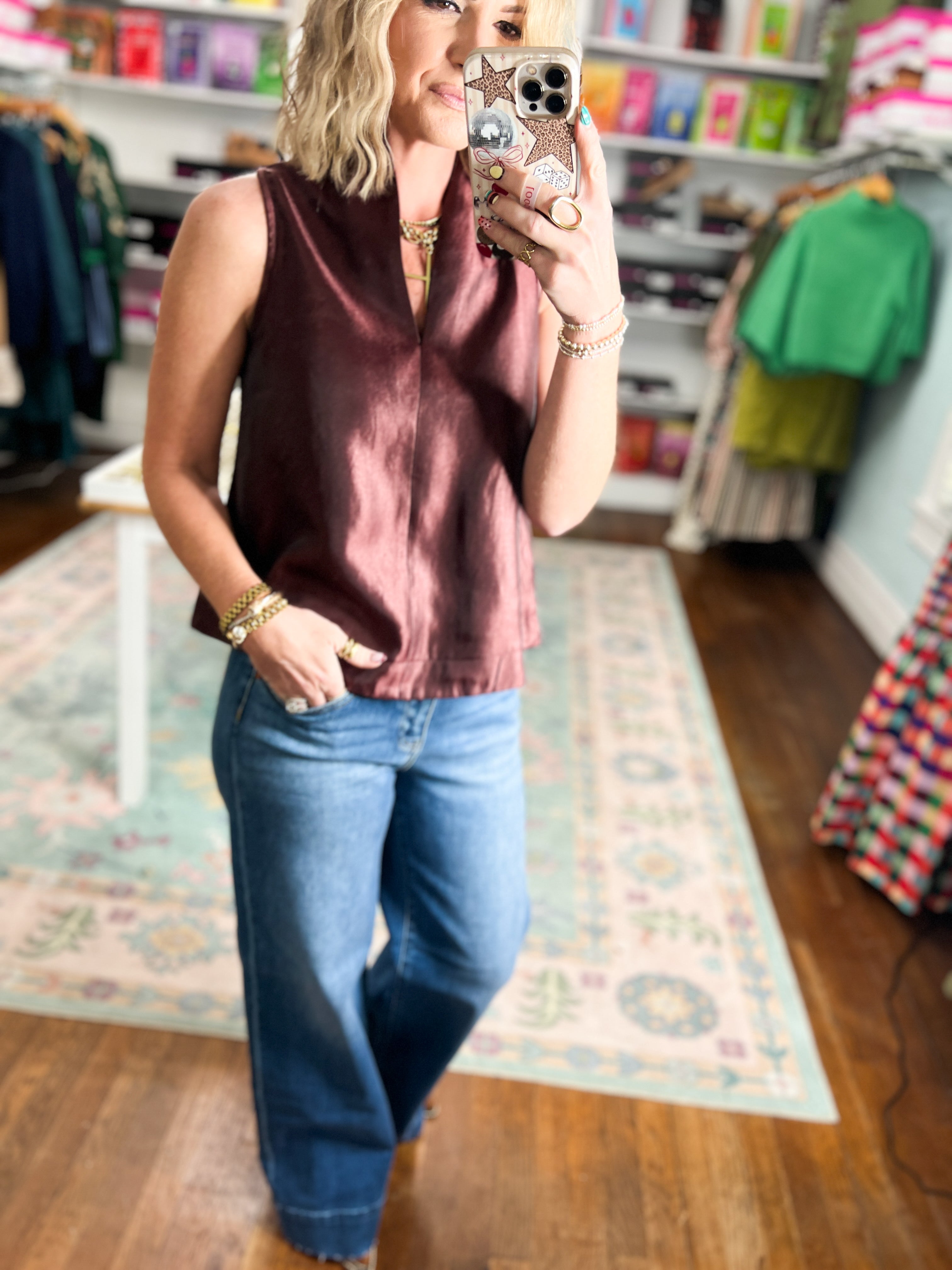 Burgundy satin-look sleeveless top with V-neck cut