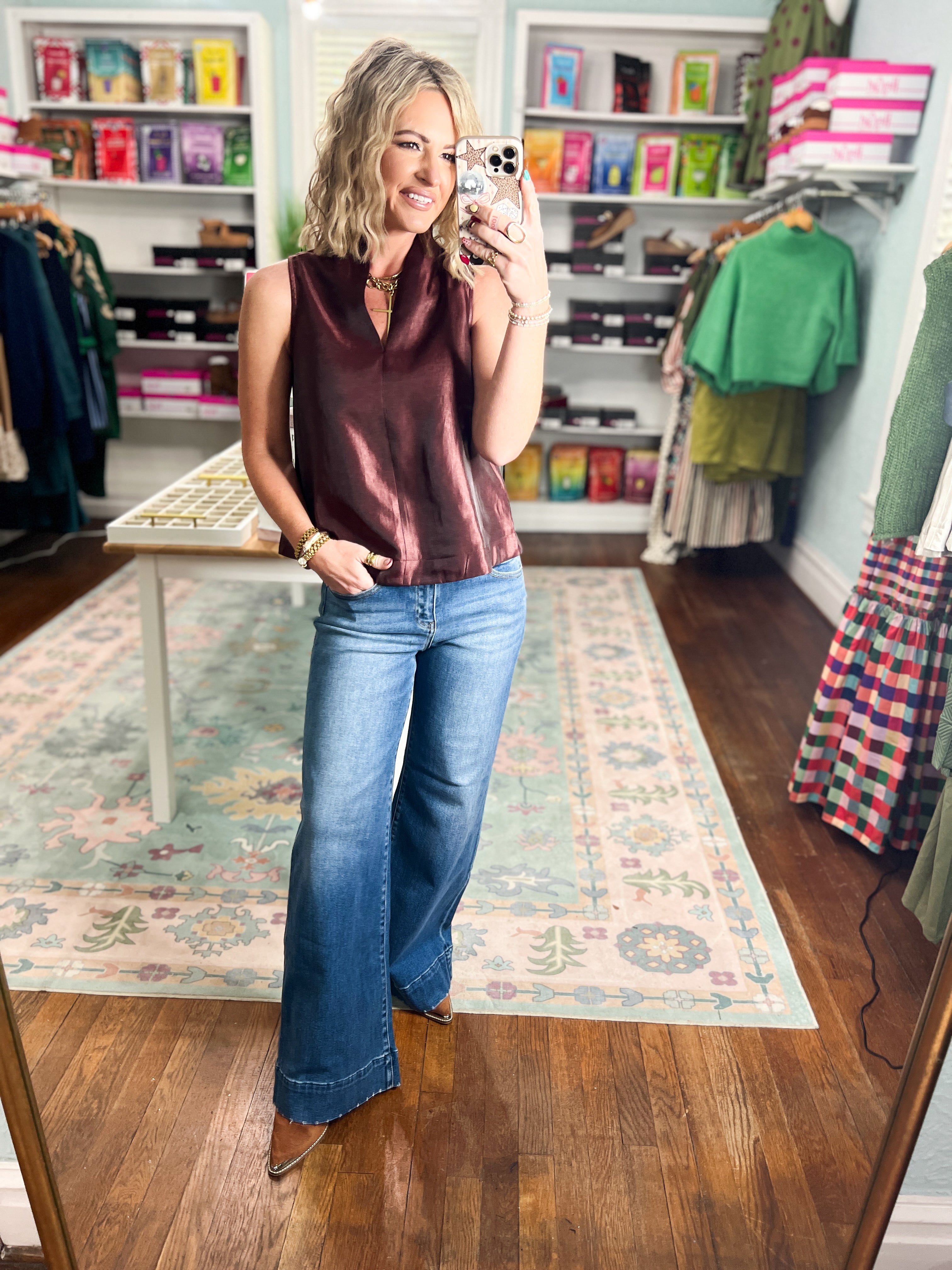 Burgundy satin-look sleeveless top with V-neck and loose fit