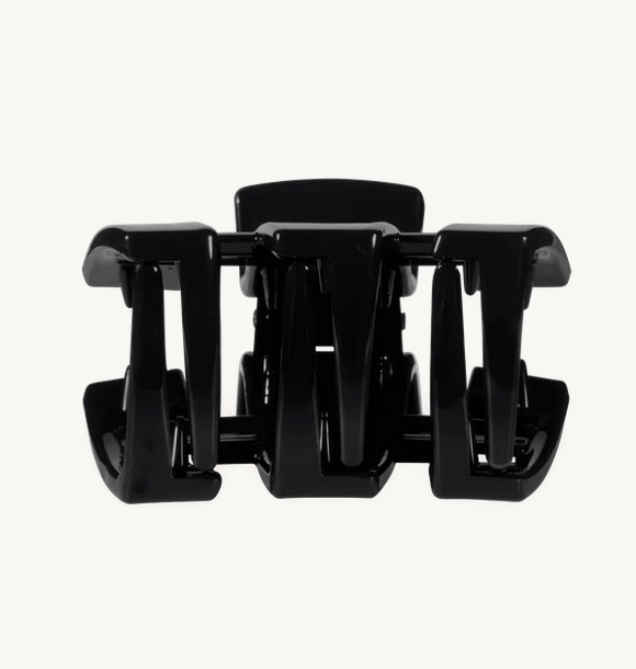Black petite claw clip, front view with multiple segmented prongs