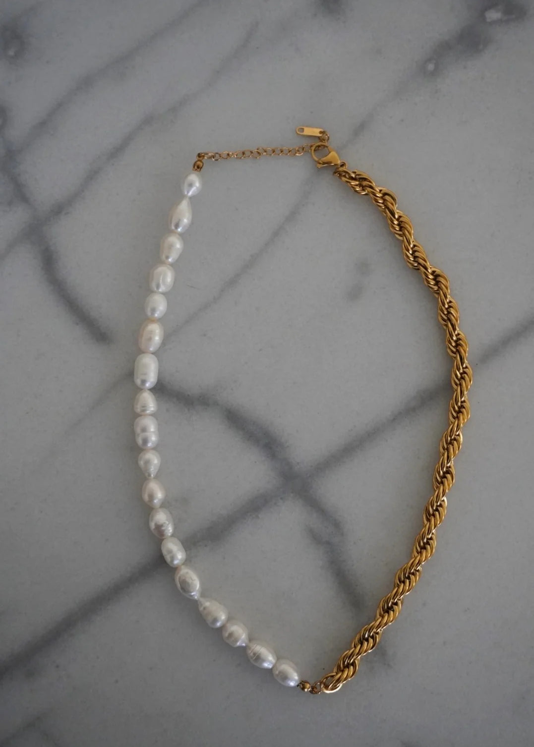 Pearl-and-gold chain necklace with white bead strand and gold link section