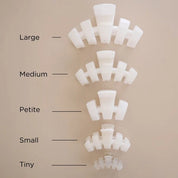 Teleties size lineup of coconut white claw clips; petite clip shown.