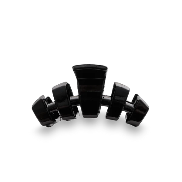 Petite black claw hair clip with curved teeth, glossy finish